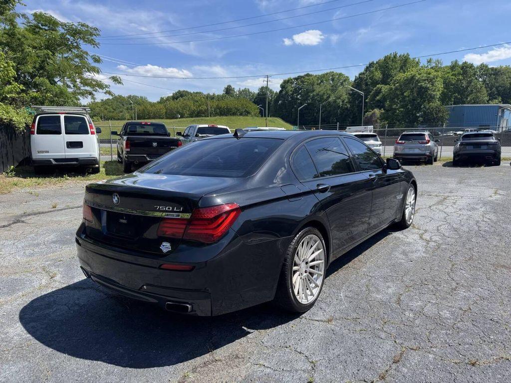 used 2015 BMW 750 car, priced at $9,995