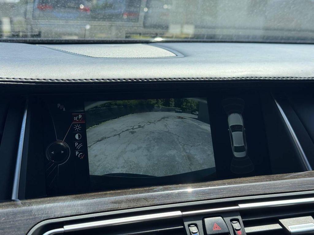 used 2015 BMW 750 car, priced at $9,995