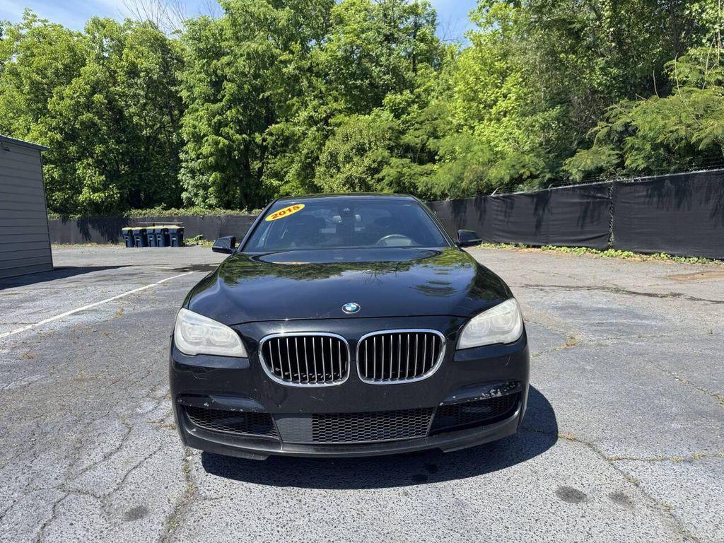 used 2015 BMW 750 car, priced at $9,995