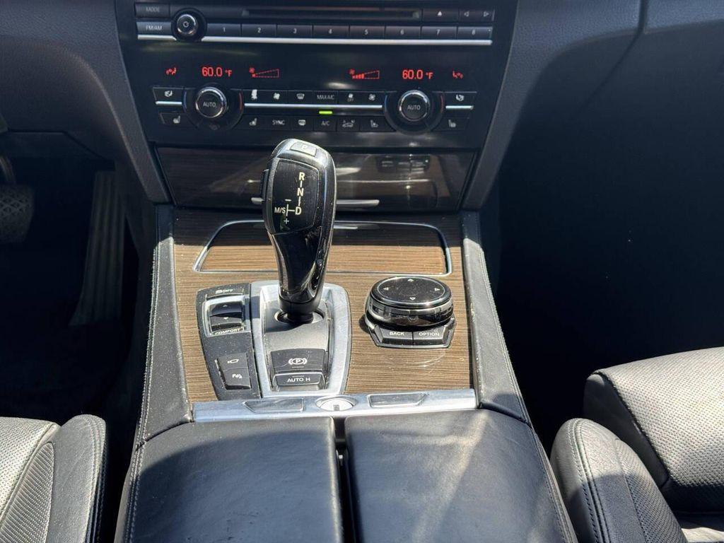 used 2015 BMW 750 car, priced at $9,995
