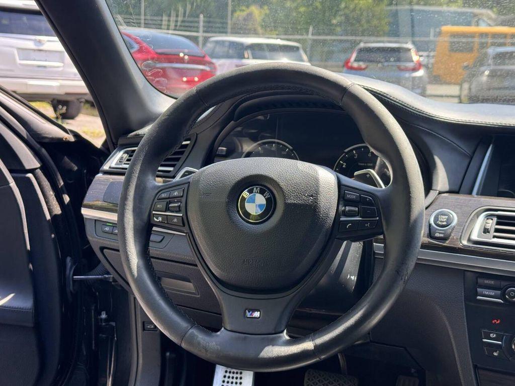 used 2015 BMW 750 car, priced at $9,995