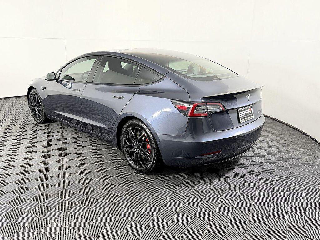 used 2022 Tesla Model 3 car, priced at $27,999