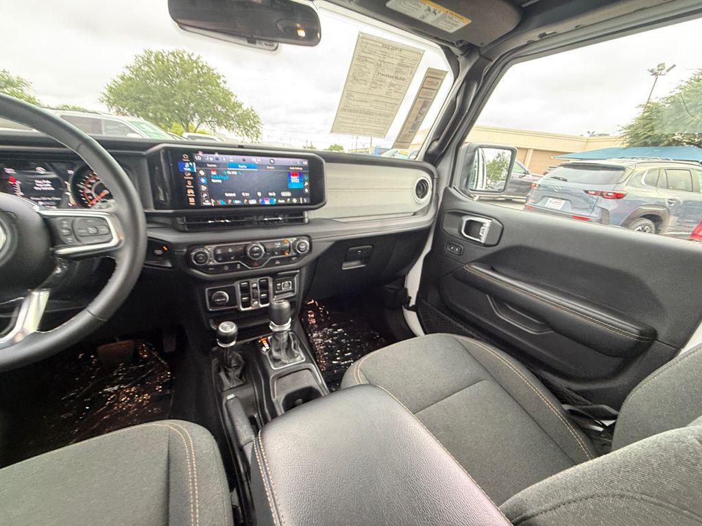 used 2025 Jeep Wrangler car, priced at $35,240