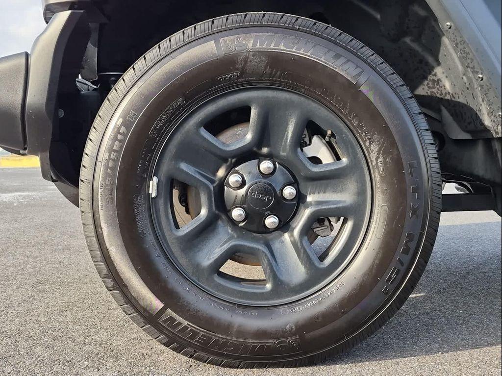 used 2023 Jeep Wrangler car, priced at $28,357