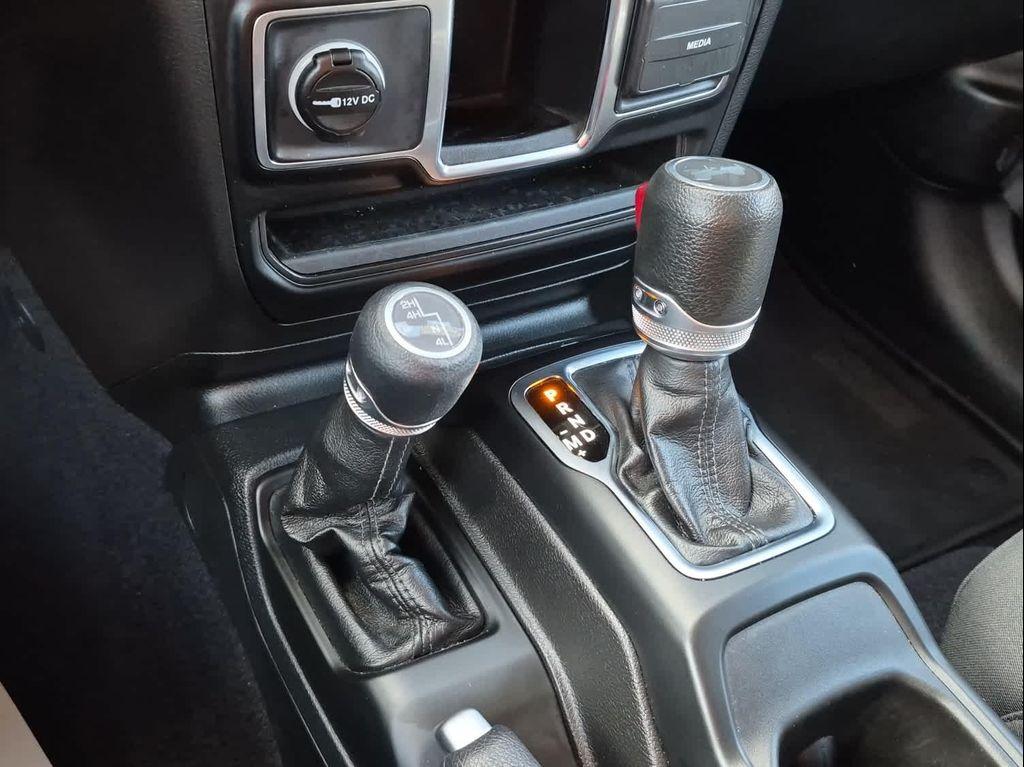 used 2023 Jeep Wrangler car, priced at $28,357