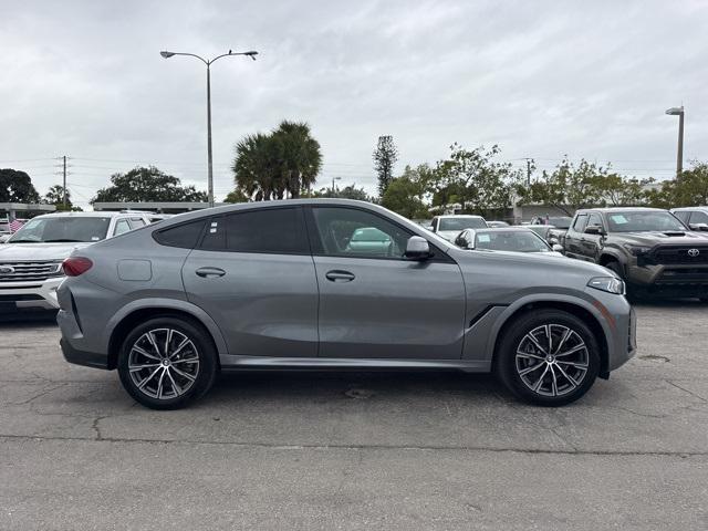 used 2025 BMW X6 car, priced at $66,588