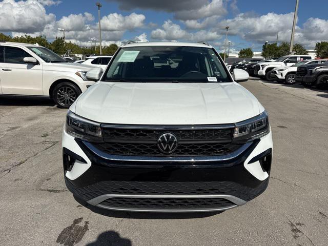 used 2024 Volkswagen Taos car, priced at $19,588