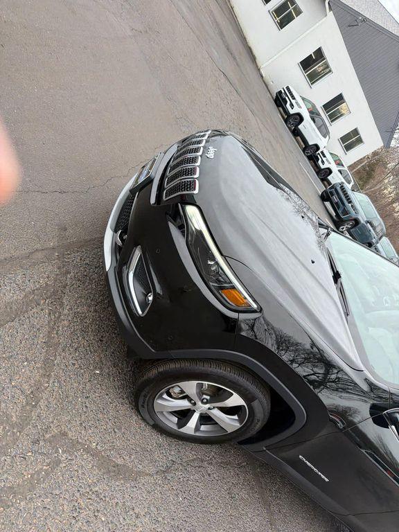 used 2021 Jeep Cherokee car, priced at $24,221