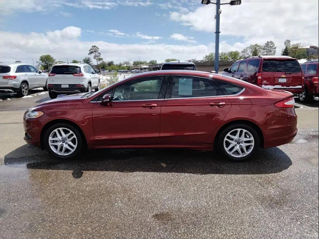 used 2014 Ford Fusion car, priced at $5,900