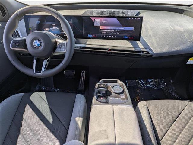 new 2026 BMW iX car, priced at $100,425