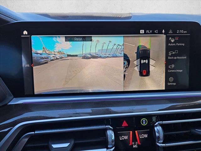 used 2023 BMW X6 car, priced at $55,997