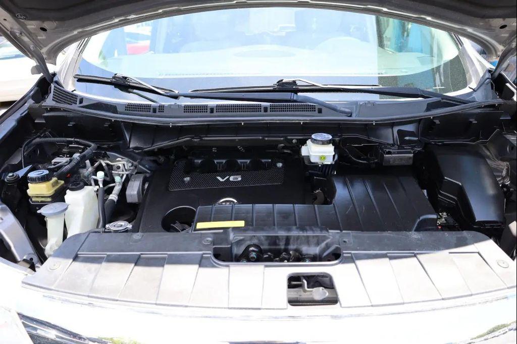 used 2015 Nissan Quest car, priced at $7,999