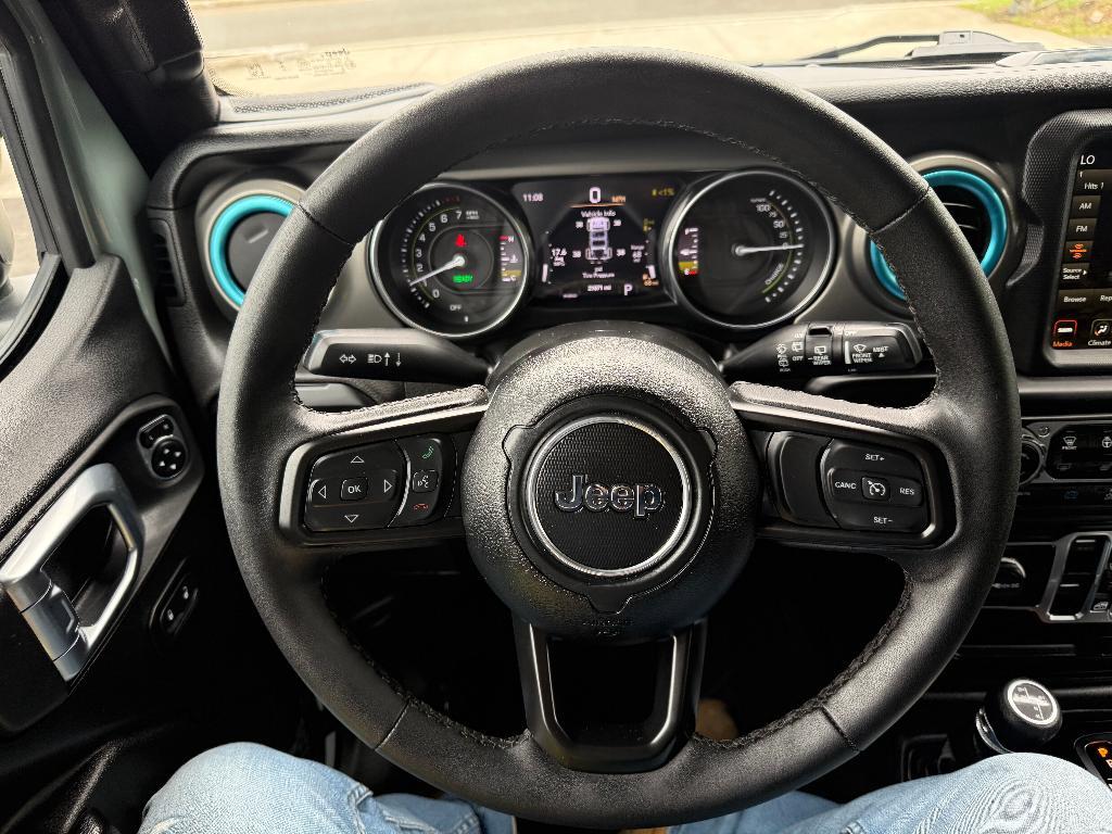 used 2023 Jeep Wrangler 4xe car, priced at $33,197