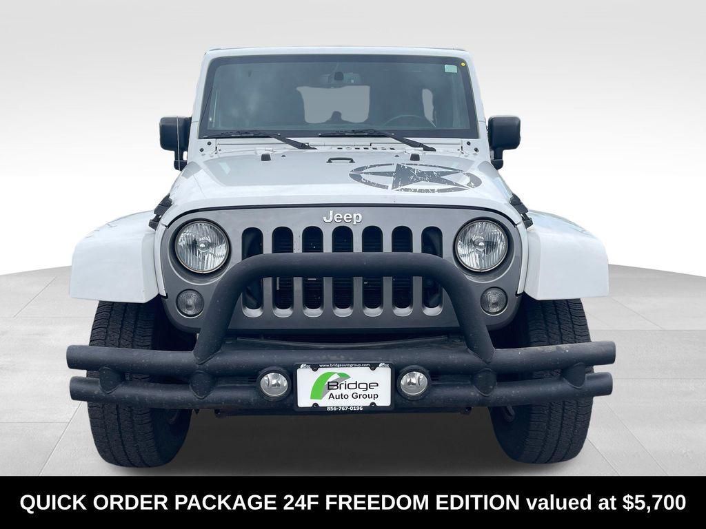 used 2015 Jeep Wrangler Unlimited car, priced at $16,859