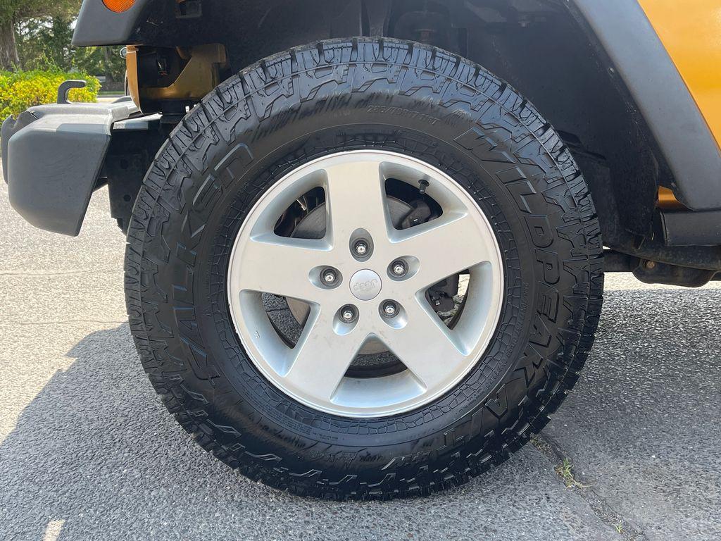 used 2014 Jeep Wrangler Unlimited car, priced at $13,576