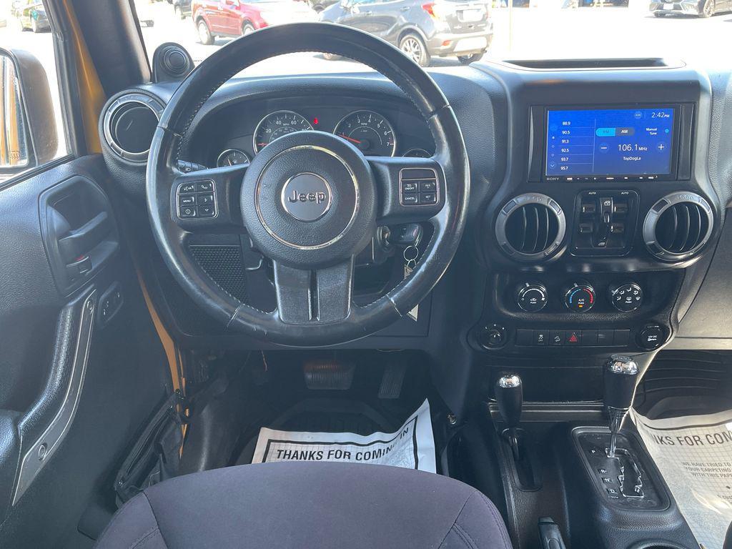 used 2014 Jeep Wrangler Unlimited car, priced at $13,576