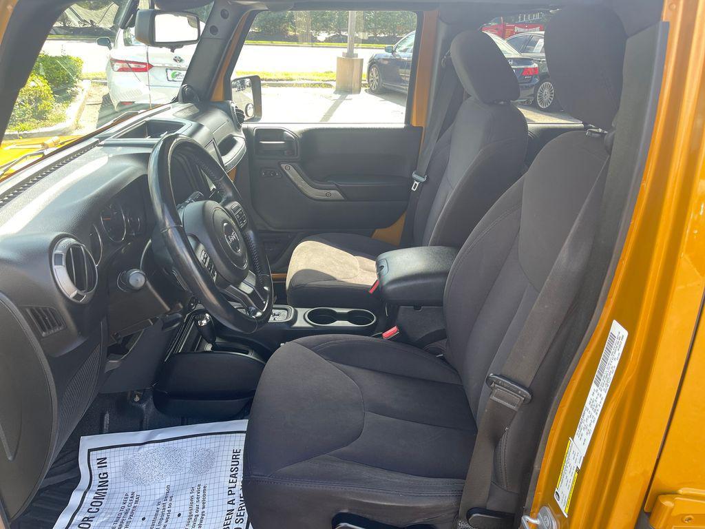used 2014 Jeep Wrangler Unlimited car, priced at $13,576