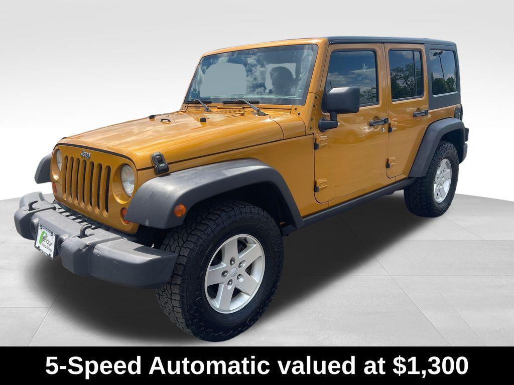 used 2014 Jeep Wrangler Unlimited car, priced at $13,576