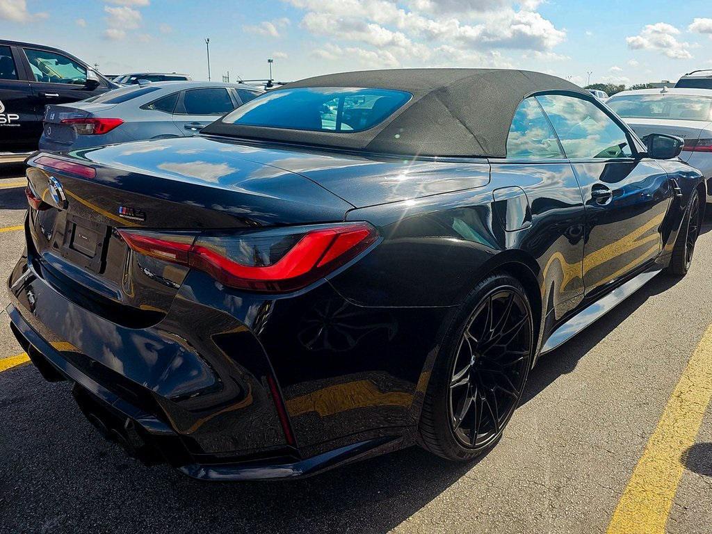 used 2024 BMW M4 car, priced at $63,635