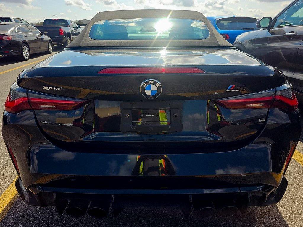 used 2024 BMW M4 car, priced at $63,635