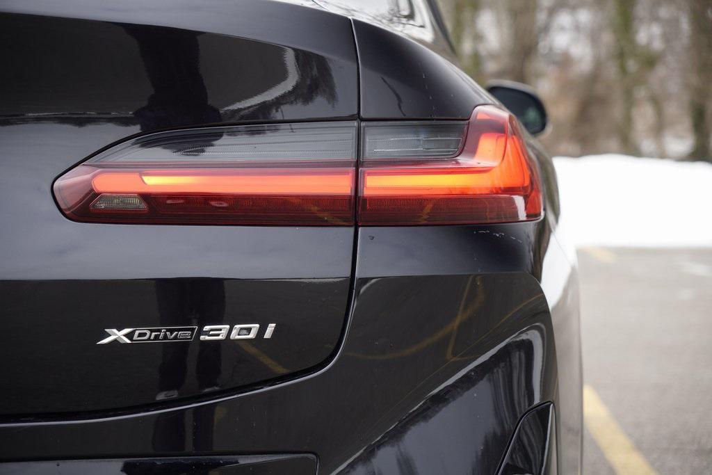 used 2024 BMW X4 car, priced at $34,595