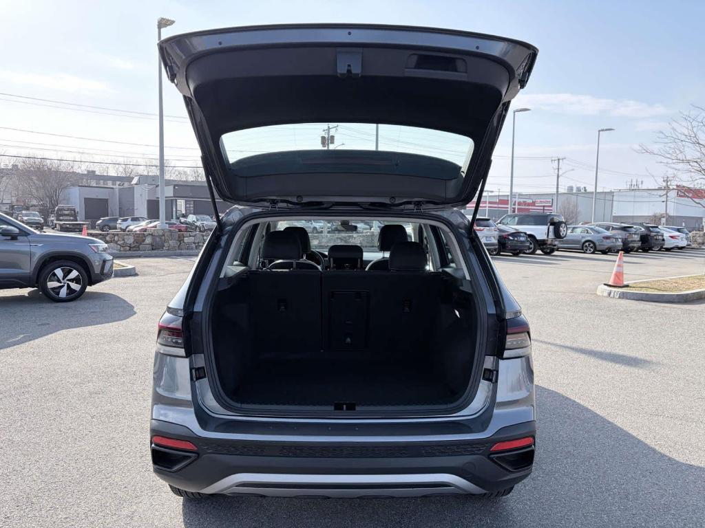 used 2025 Volkswagen Taos car, priced at $23,595