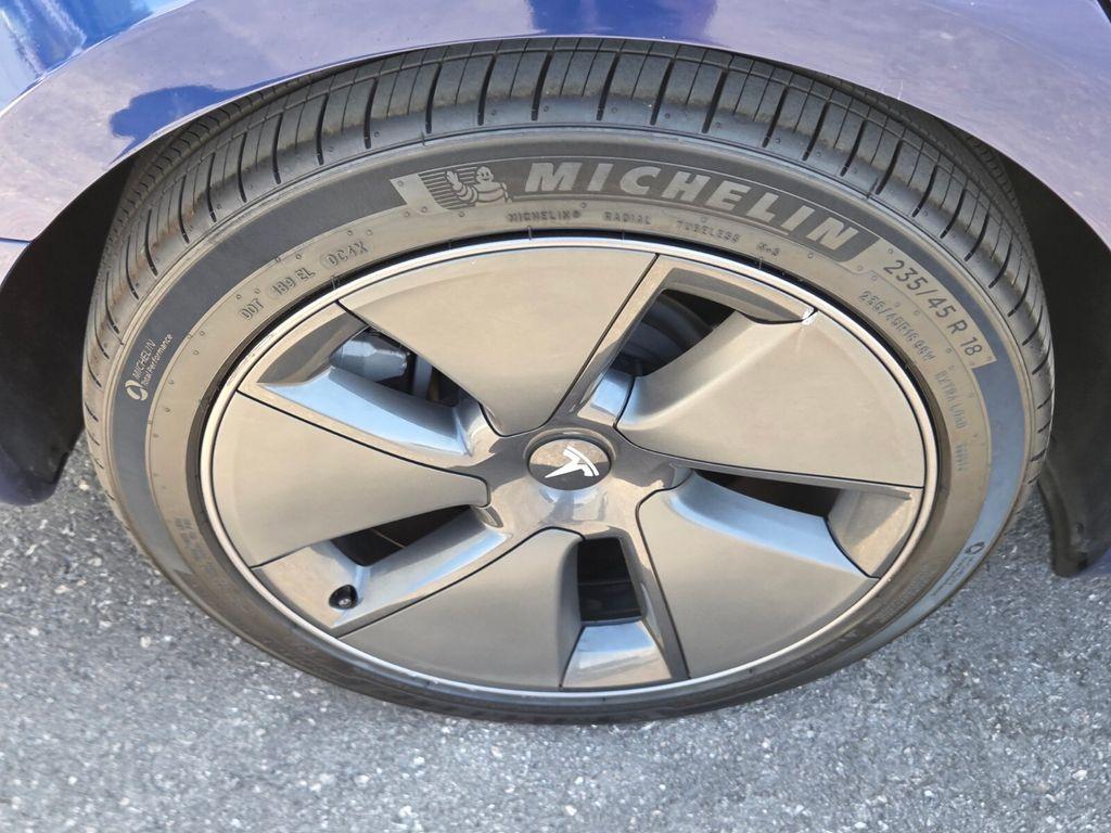 used 2023 Tesla Model 3 car, priced at $26,936