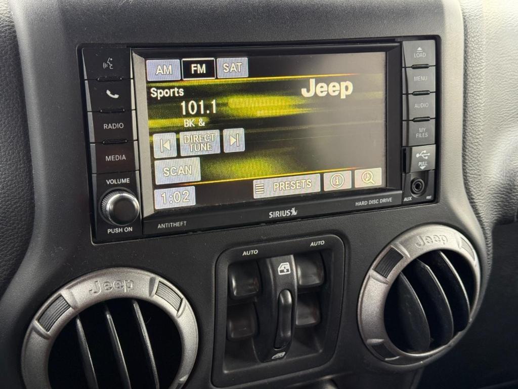 used 2016 Jeep Wrangler Unlimited car, priced at $15,990