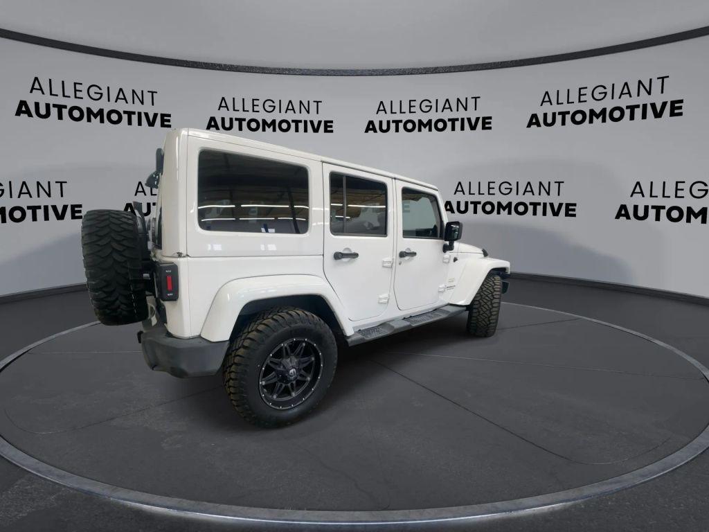 used 2014 Jeep Wrangler Unlimited car, priced at $14,759
