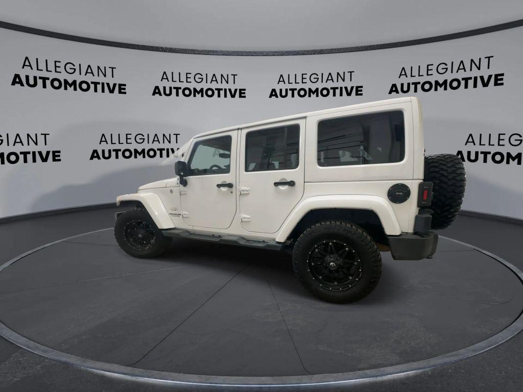 used 2014 Jeep Wrangler Unlimited car, priced at $14,759
