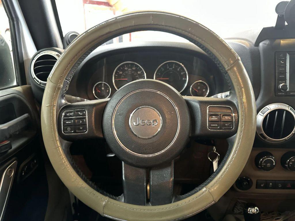 used 2014 Jeep Wrangler Unlimited car, priced at $14,759