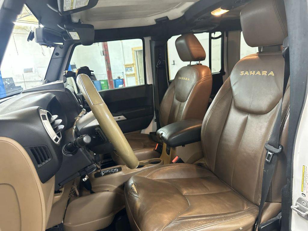 used 2014 Jeep Wrangler Unlimited car, priced at $14,759