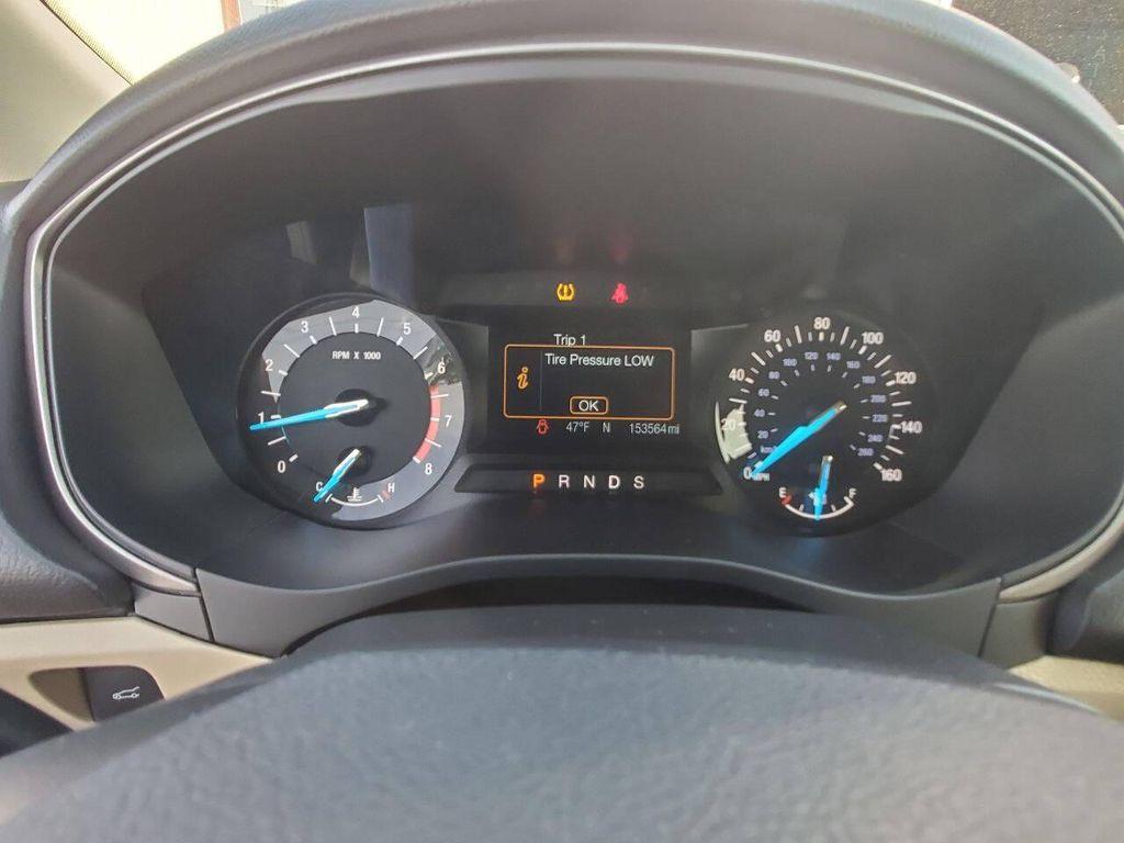 used 2015 Ford Fusion car, priced at $6,788