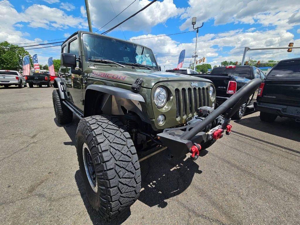 used 2015 Jeep Wrangler Unlimited car, priced at $19,688