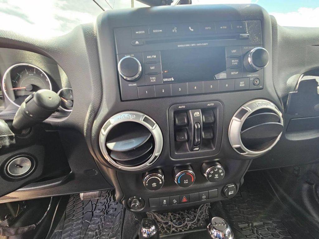 used 2015 Jeep Wrangler Unlimited car, priced at $19,688