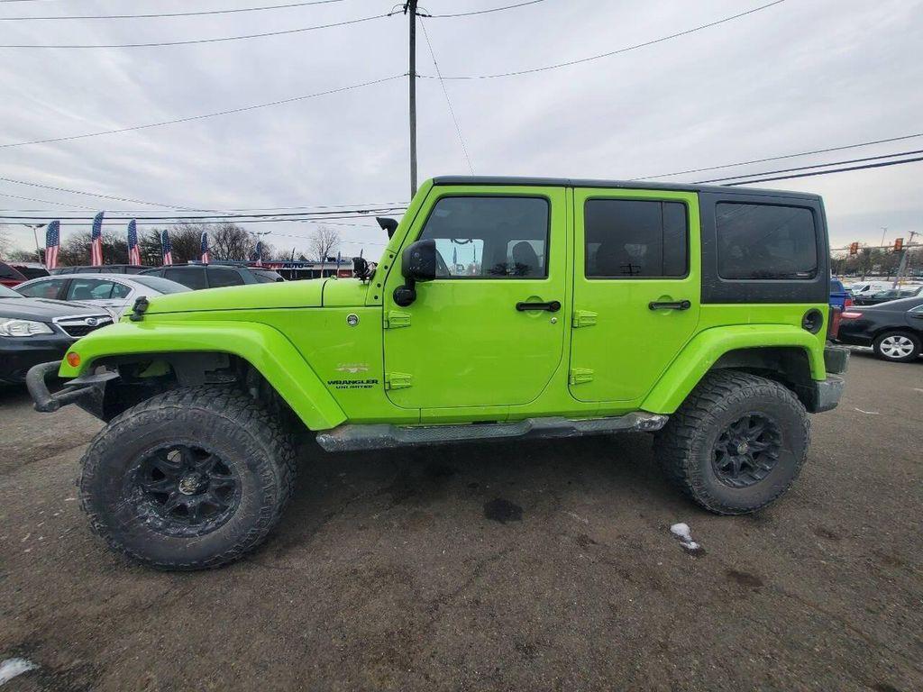 used 2013 Jeep Wrangler Unlimited car, priced at $16,988