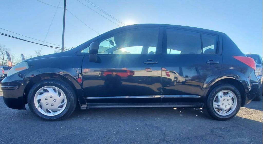 used 2009 Nissan Versa car, priced at $4,288