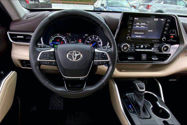 used 2021 Toyota Highlander Hybrid car, priced at $28,985