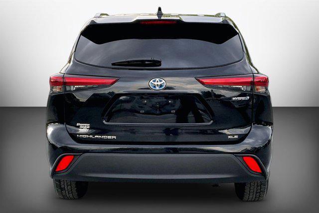 used 2021 Toyota Highlander Hybrid car, priced at $28,985