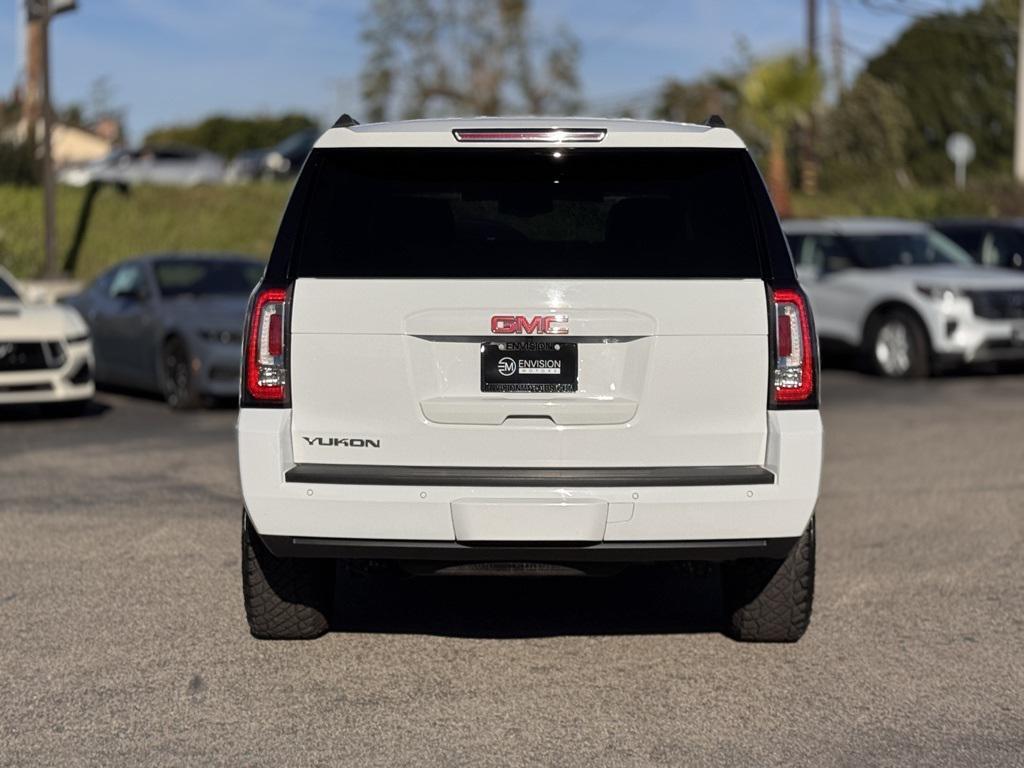 used 2019 GMC Yukon car, priced at $27,351
