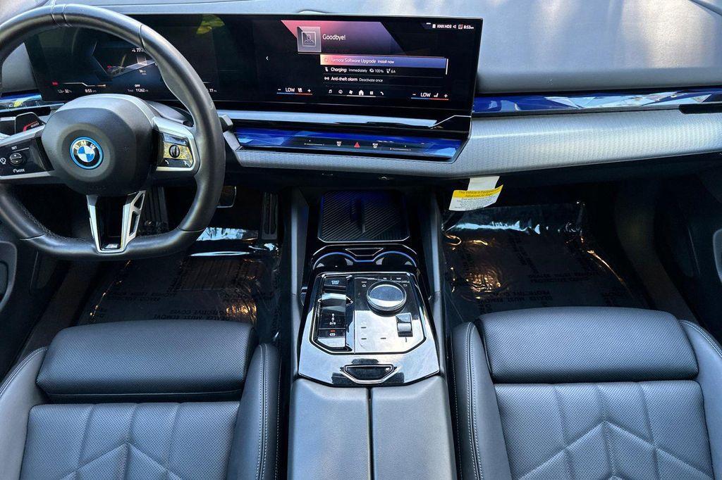 used 2025 BMW i5 car, priced at $56,418