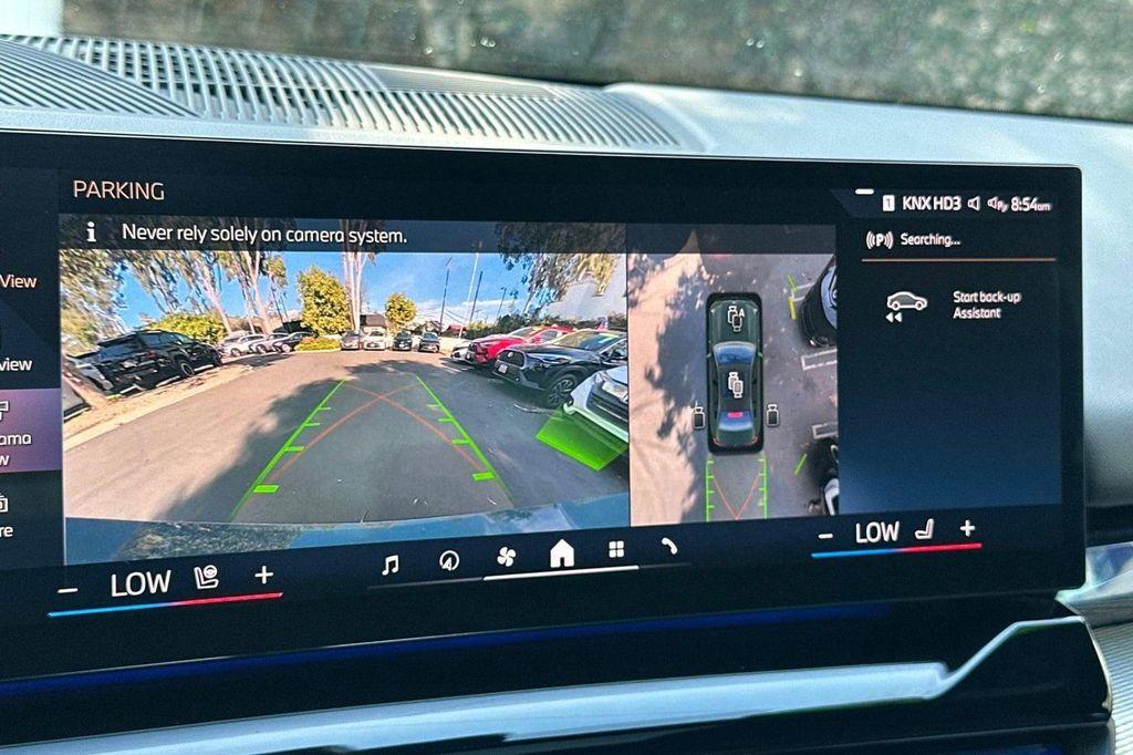 used 2025 BMW i5 car, priced at $56,418