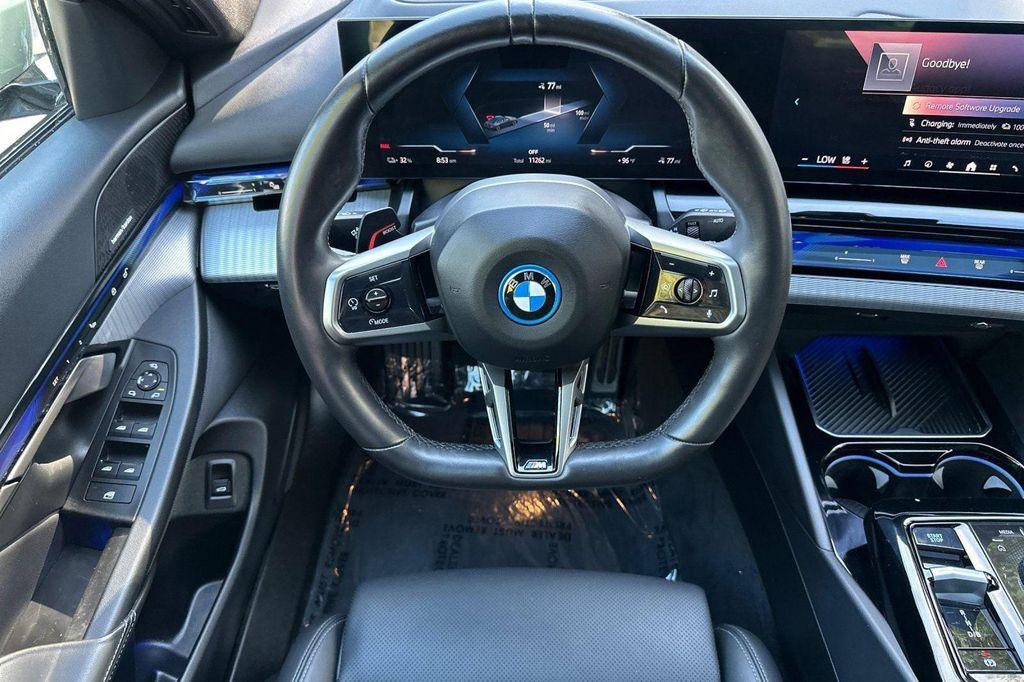 used 2025 BMW i5 car, priced at $56,418