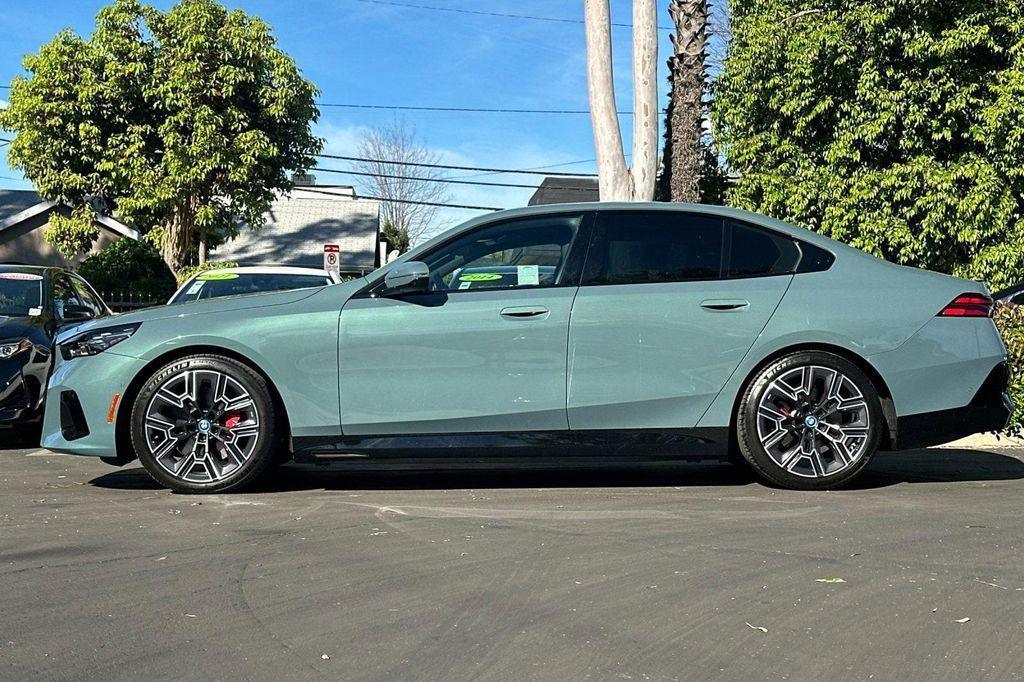 used 2025 BMW i5 car, priced at $56,418