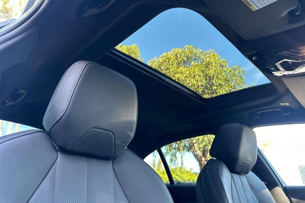 used 2025 BMW i5 car, priced at $56,418