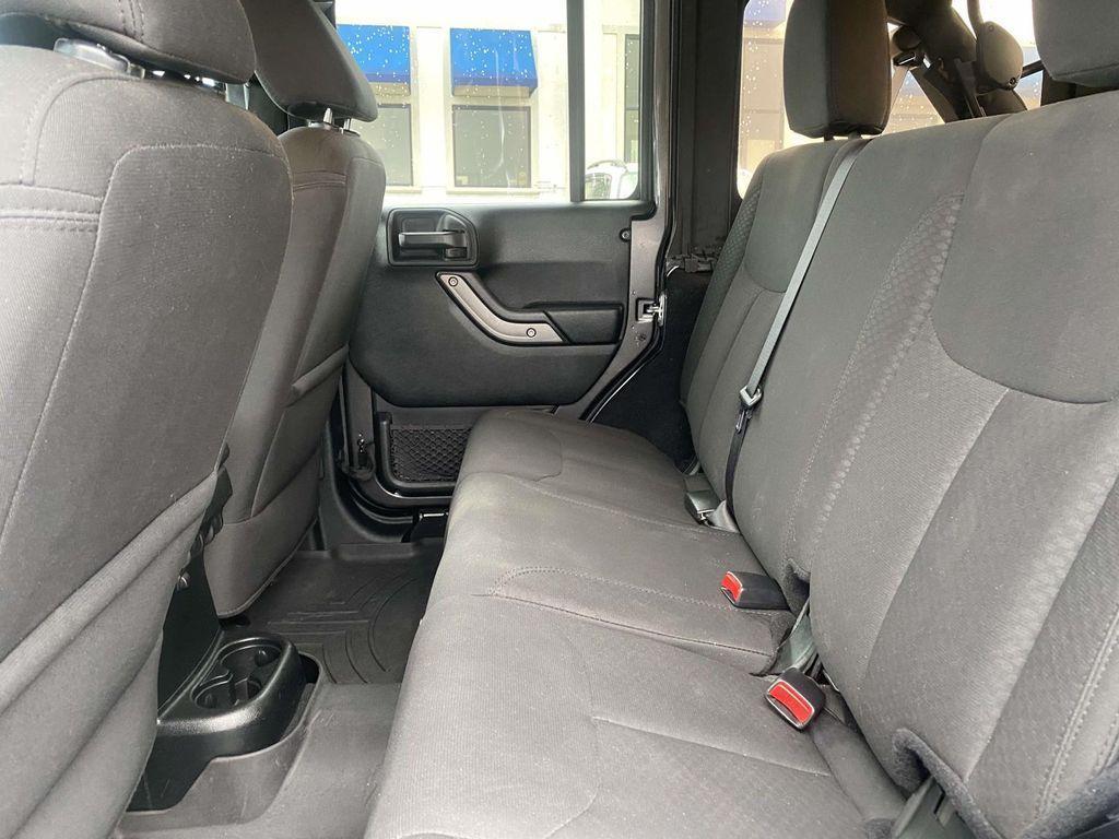 used 2018 Jeep Wrangler JK Unlimited car, priced at $21,620