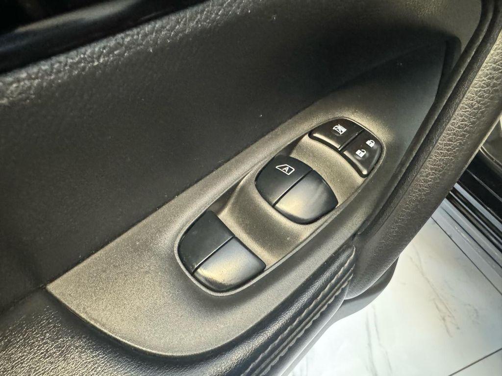 used 2021 Nissan Rogue Sport car, priced at $14,998