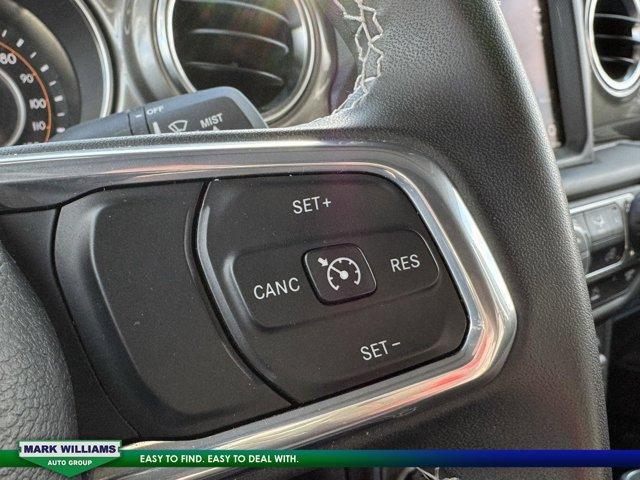 used 2023 Jeep Wrangler car, priced at $29,398