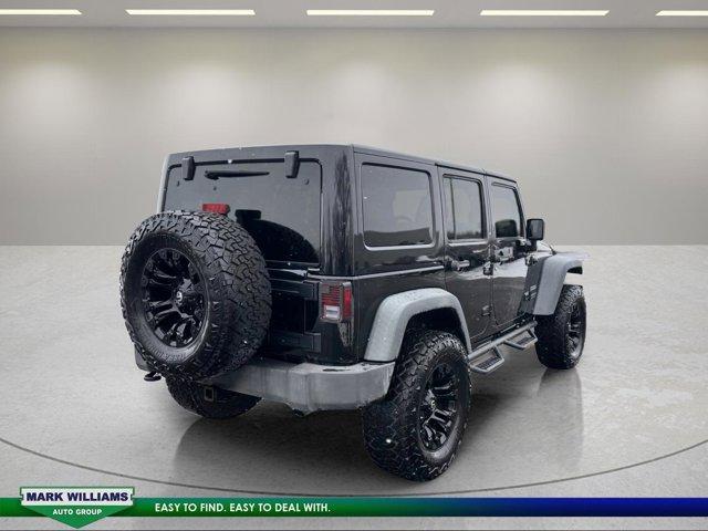 used 2014 Jeep Wrangler Unlimited car, priced at $15,968