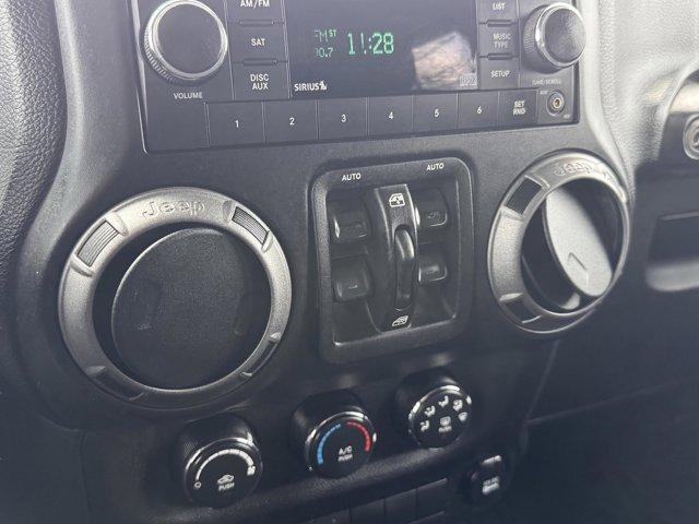 used 2014 Jeep Wrangler Unlimited car, priced at $15,968